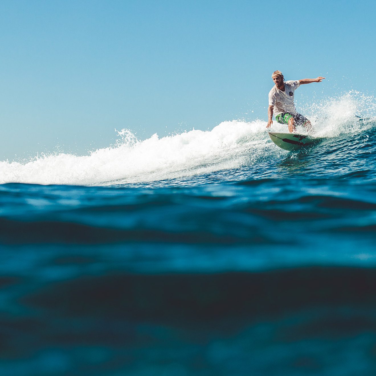 Surfer at Pumula Beach Hotel